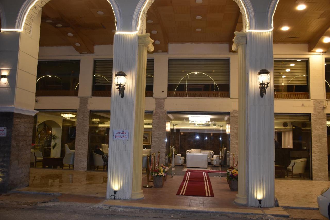 Madison Hotel Аман Екстериор снимка