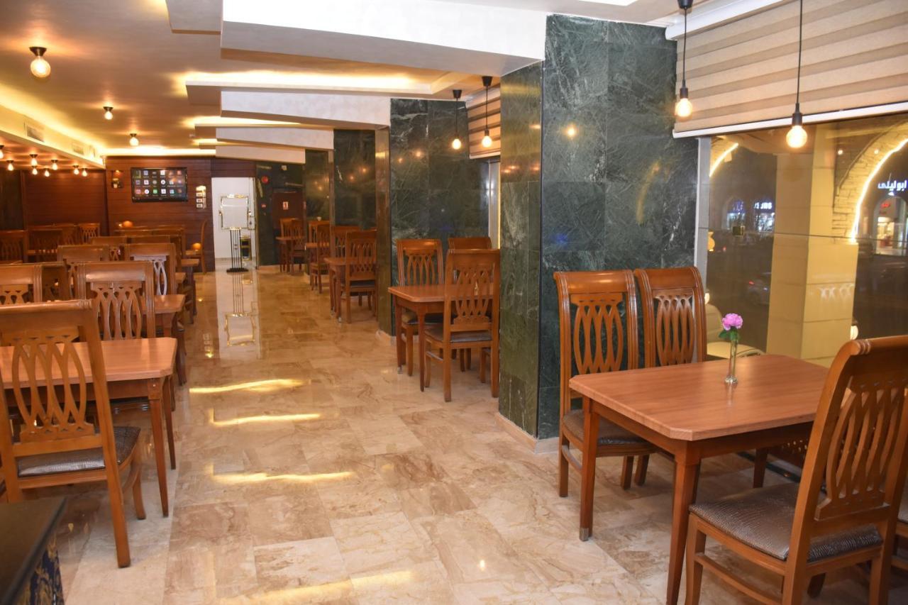 Madison Hotel Аман Екстериор снимка