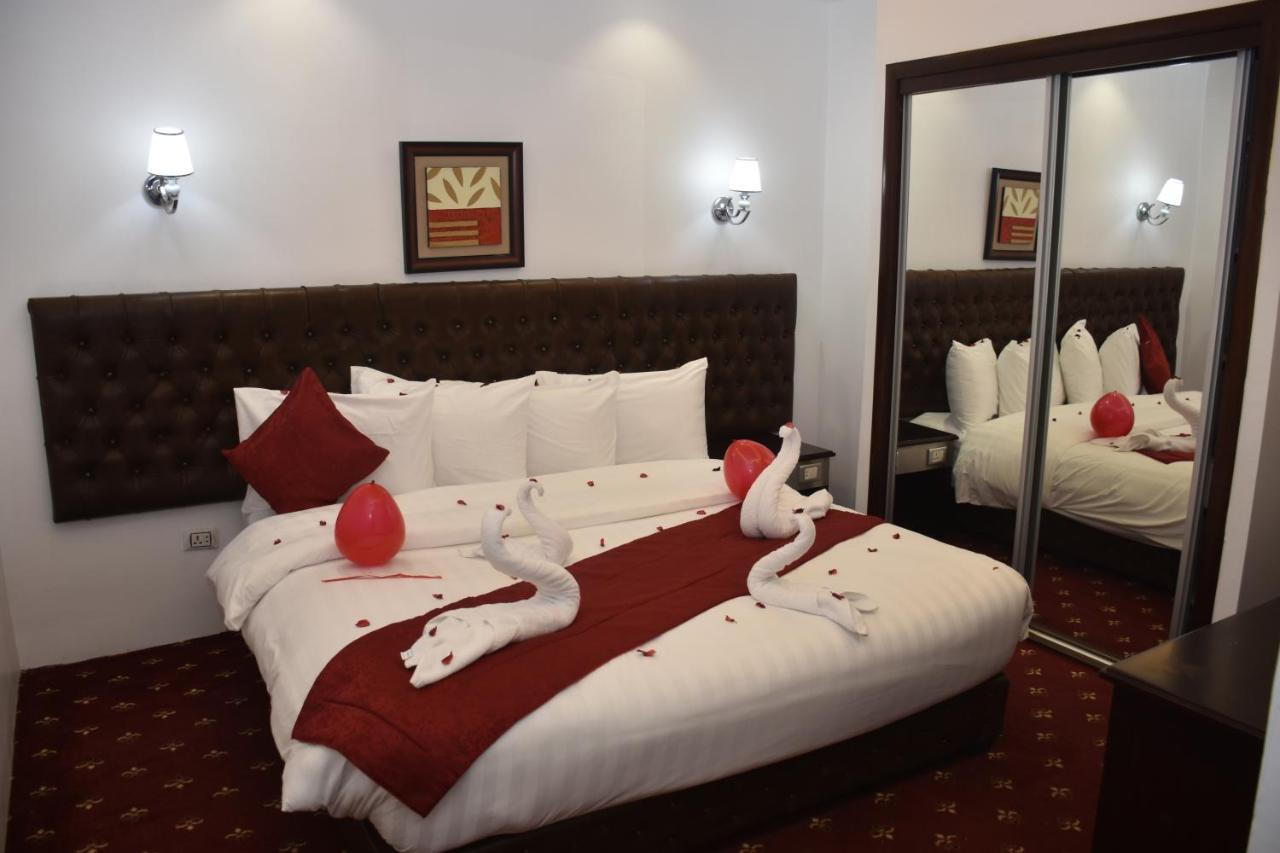 Madison Hotel Аман Екстериор снимка