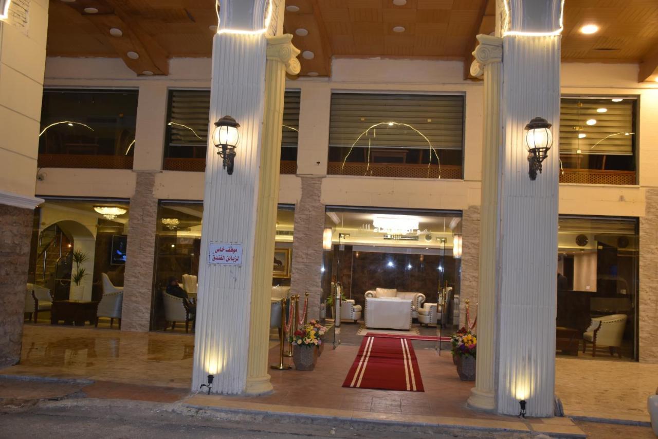 Madison Hotel Аман Екстериор снимка