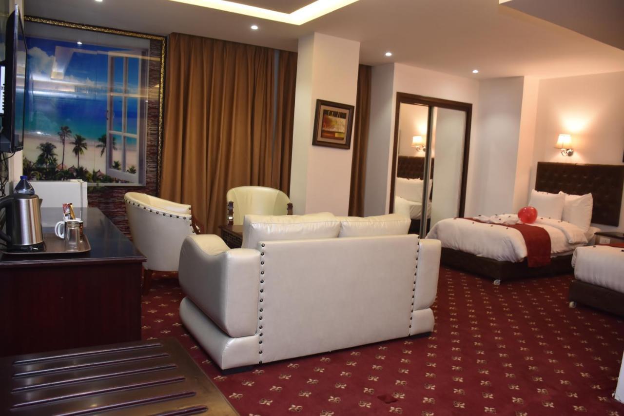 Madison Hotel Аман Екстериор снимка
