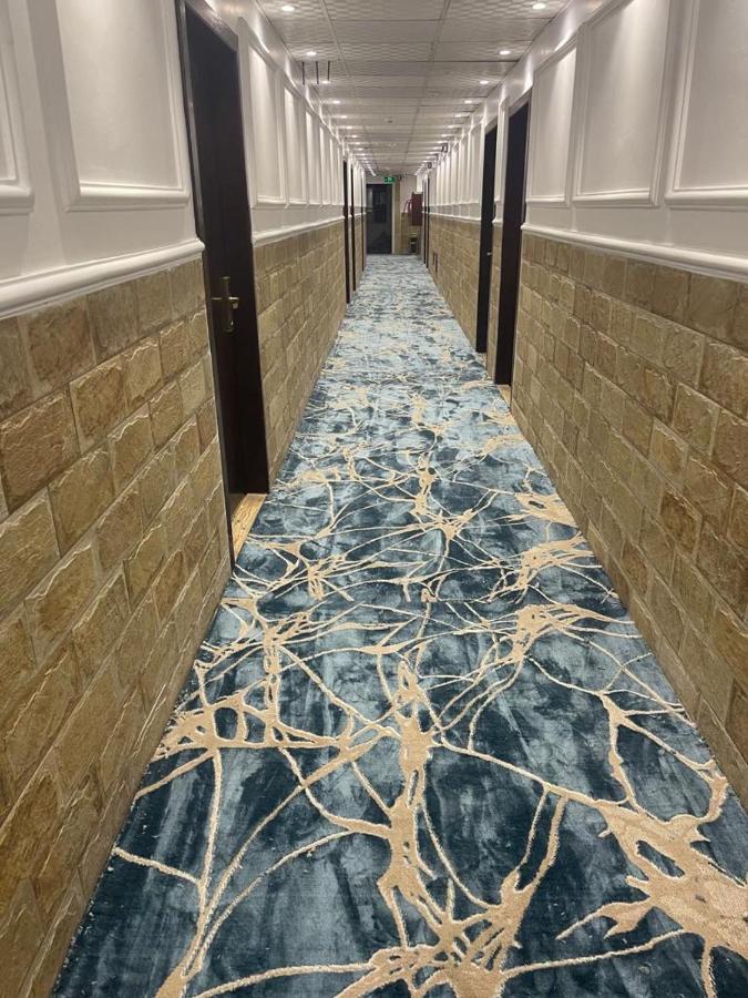 Madison Hotel Аман Екстериор снимка